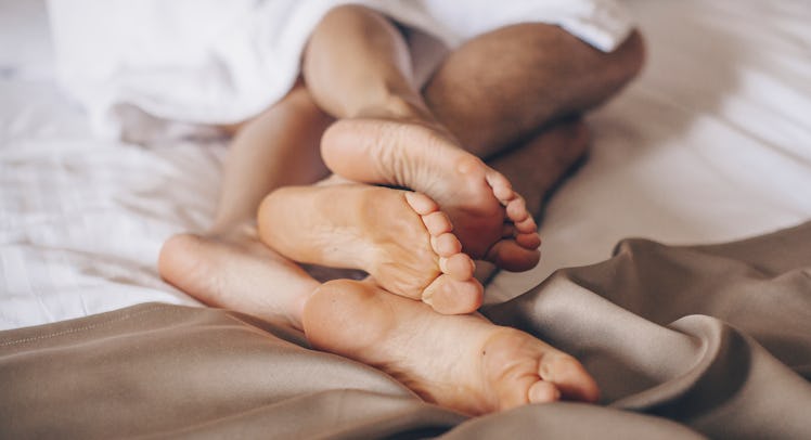 Lifestyle. Beautiful couple in bed