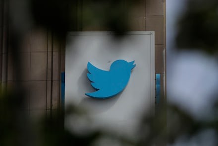 A sign outside of the Twitter office building in San Francisco. The Saudi government recruited two T...