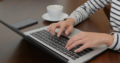 Woman type on laptop computer