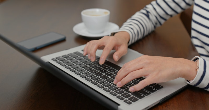Woman type on laptop computer