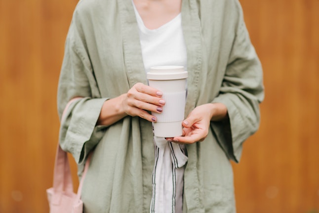 To thoroughly clean your reusable cup, use hot and soapy water, and consider adding a dash of bleach to effectively kill germs.