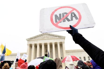 Gun protest, NRA. Protesters gather outside the Supreme Court in Washington, during arguments in the...