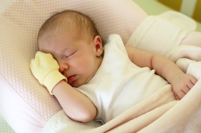 Experts explain that parents may consider their babies sleeping in mittens to prevent scratching.