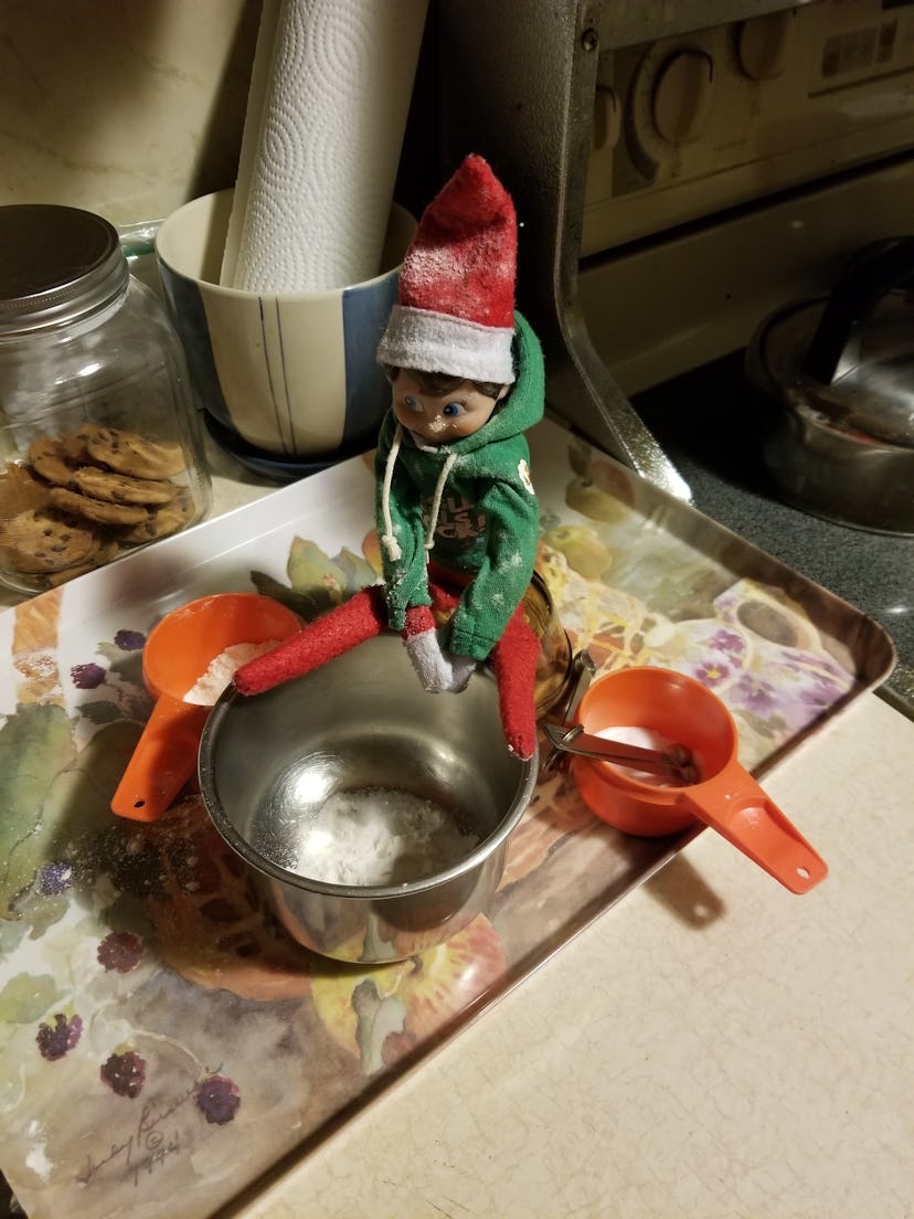 Elf on a shelf making sugar cookied