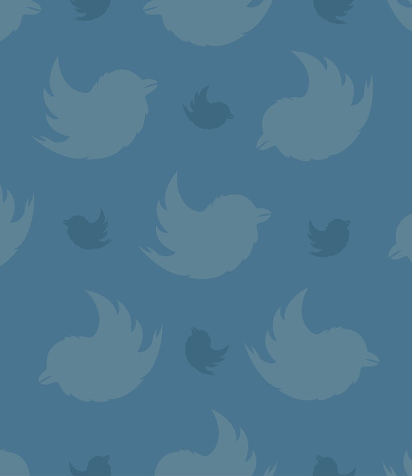 Seamless pattern from birds on a pastel blue background. The Bullfinch Pattern