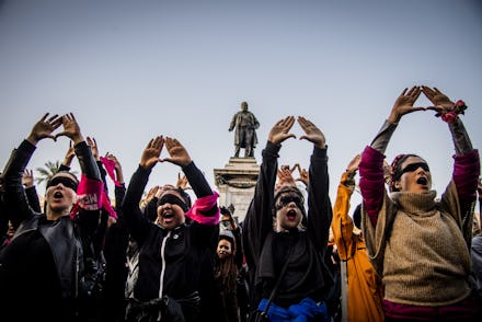 Female demonstrators during the flash mob 'Un violador en tu camino' in protest of violence against ...