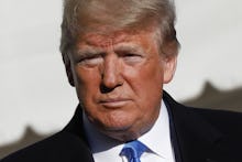 U.S. President Donald Trump pauses as he speaks to the media on the South Lawn of the White House in...