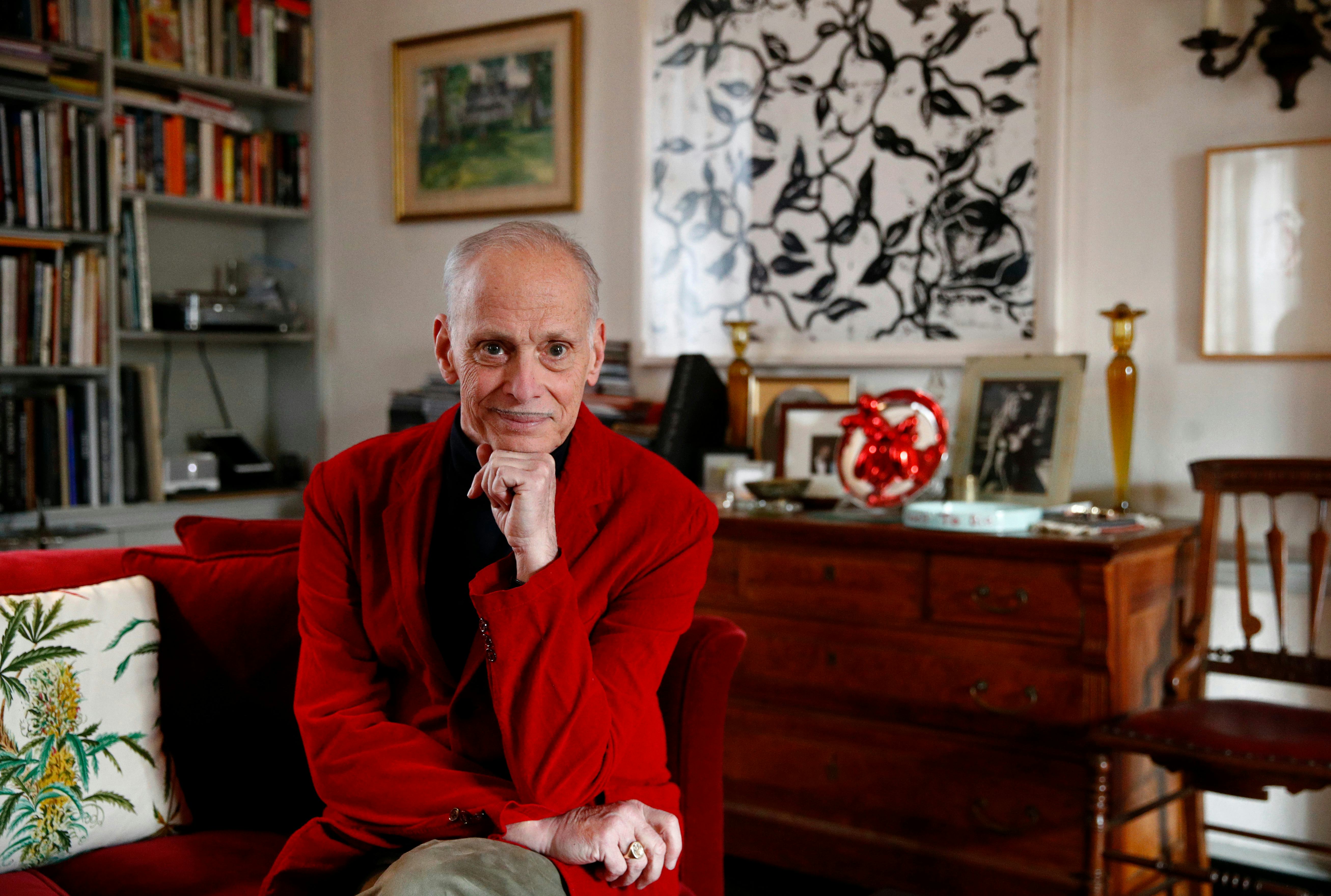 Filmmaker John Waters poses for a photograph during an interview with The Associated Press at his ho...