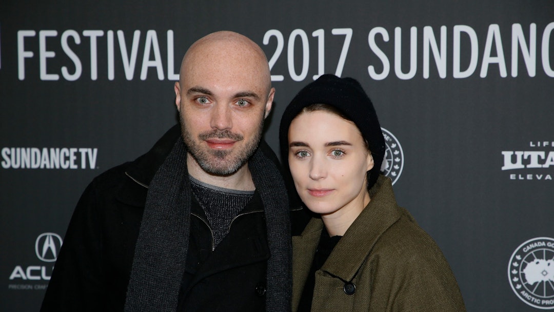 Writer and director David Lowery, left, and actress Rooney Mara, right, pose at the premiere of "A G...