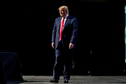 President Donald Trump takes the stage at the Turning Point USA Student Action Summit at the Palm Be...