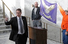 Rep. Matt Shea, left, R-Spokane Valley, gestures as he gives a speech in front of the liberty state ...