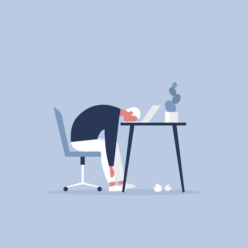 Professional burnout. Young exhausted manager sitting at the office. Long working day. Millennials a...