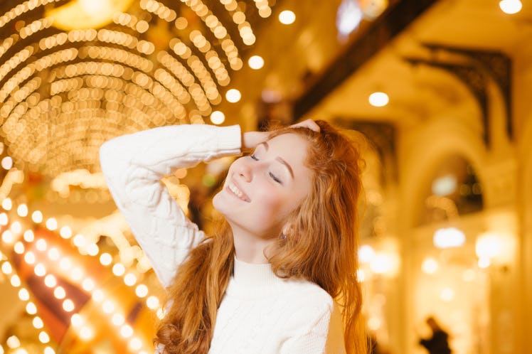 the red-haired girl on the background of night city