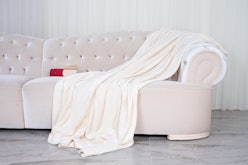 wellsoft throw blanket on the white sofa