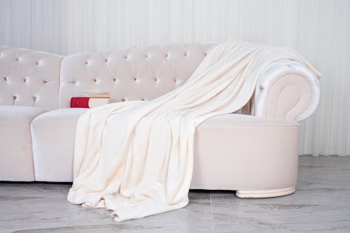 wellsoft throw blanket on the white sofa