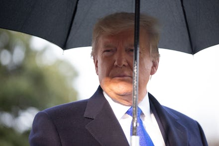 United States President Donald Trump speaks to members of the media on the South Lawn before he depa...