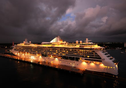 Ocean liner brightly lit at night