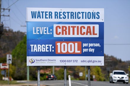 A billboard indicates critical water levels near Stanthorpe, Queensland, Australia, 16 October 2019 ...