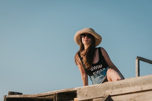 Woman relaxing and enjoying in a sunset