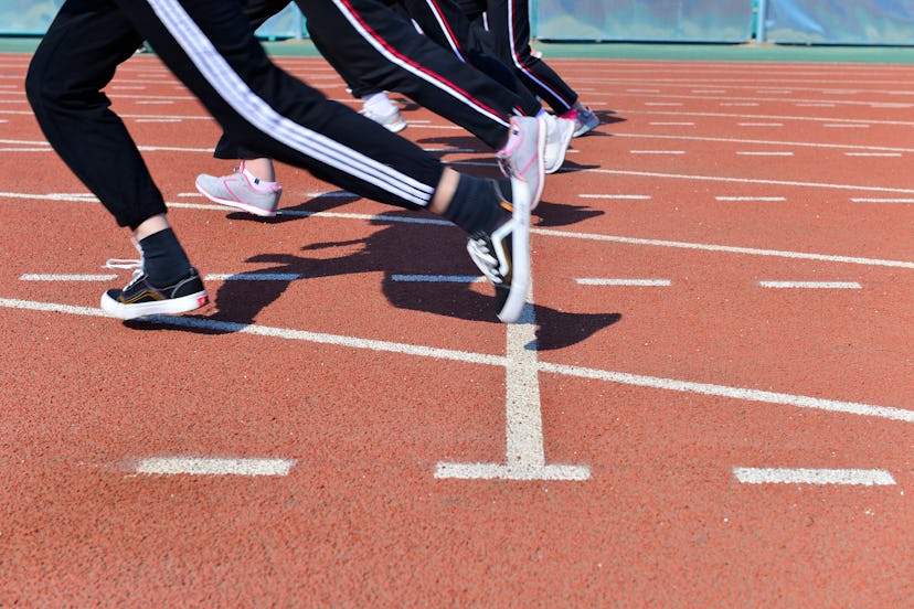 The number of athletes and the track on the runway