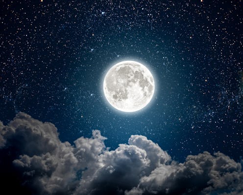 background night sky with stars, moon and clouds. Elements of this image furnished by NASA