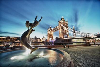 Tower Bridge and St Katharine Docks Girl with a dolpin fountain