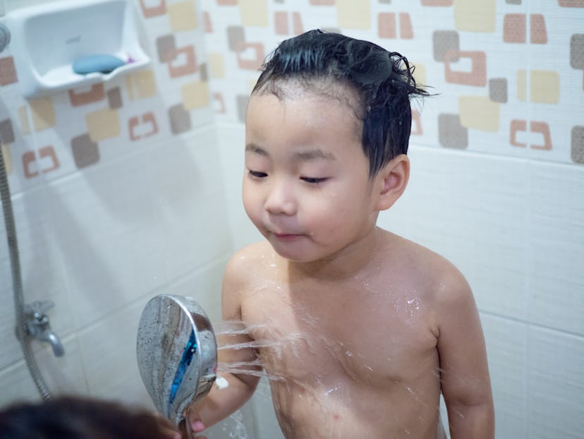 asia boy take a shower 