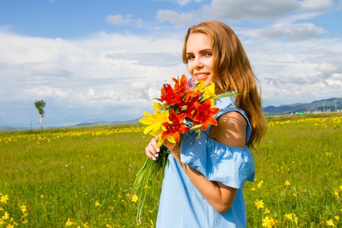 happy girls with a bouquet of wildflowers