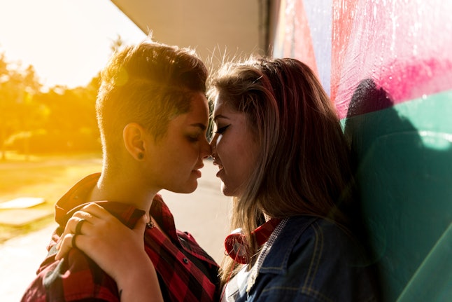 Lesbian Couple Kissing on Sunset Time