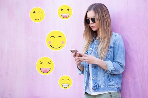 Cute Young Adult Girl Typing on Smartphone With Variable Yellow Emoticons Sticker Communication Con...