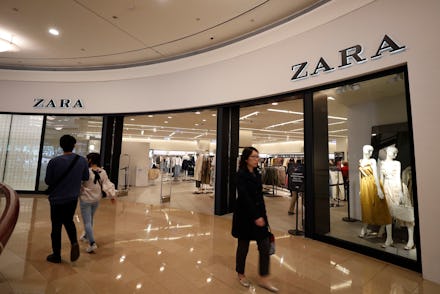Customers walk past Zara, a Spanish fast fashion retailer store in Taipei, Taiwan, 13 March 2019 (is...