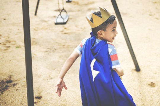 Young Boy Superhero Costume Playground Concept