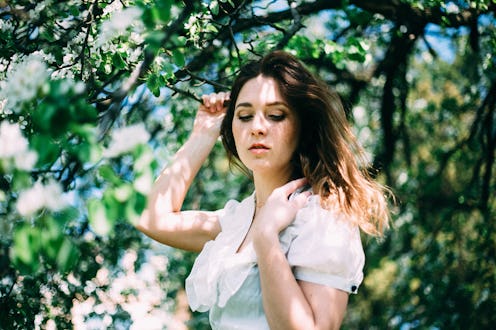 Beautifull woman in flowers.