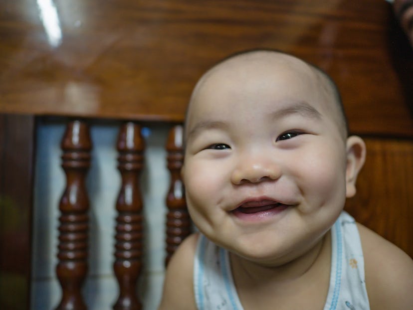 Asian boy baby or infant smile very happy