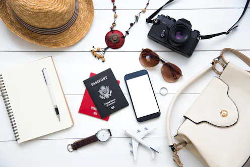Travel accessories costumes for women. Passports, The cost of travel maps prepared for the trip on w...