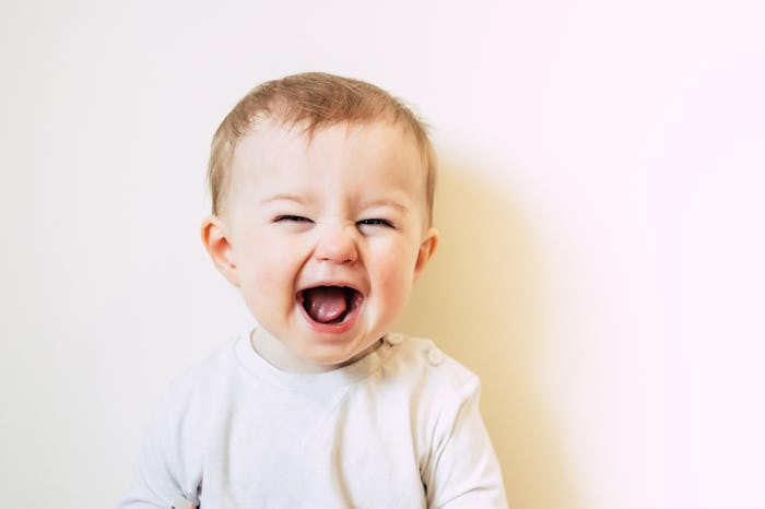 Baby with flu laughing