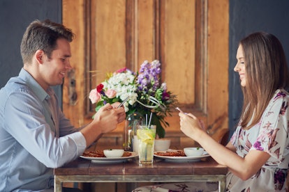 Romantic couple dating in restaurant