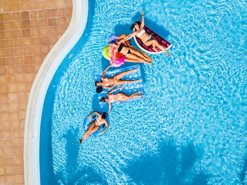 Coloured aerial background with group of friends woman caucasian people enjoying the summer holiday ...