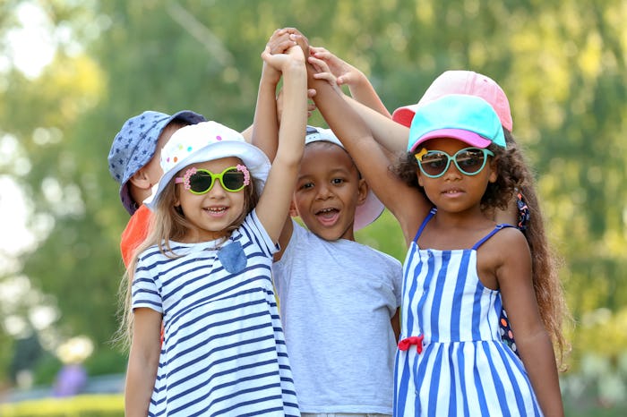 Cute little children playing outdoors