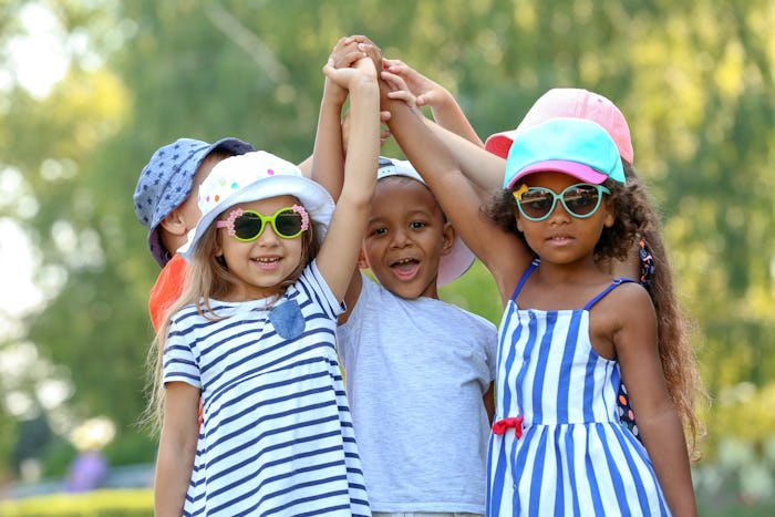 Cute little children playing outdoors