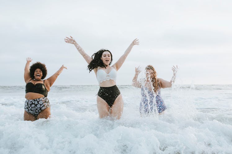 Diverse plus size women having fun in the water