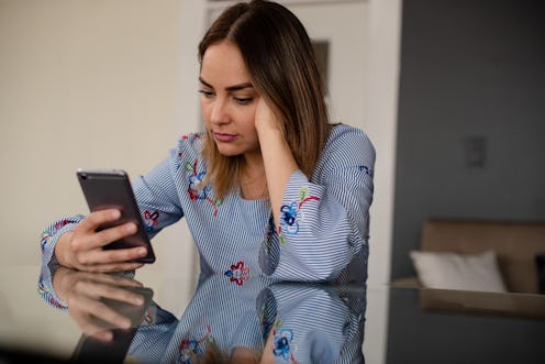 latin women on cell phone