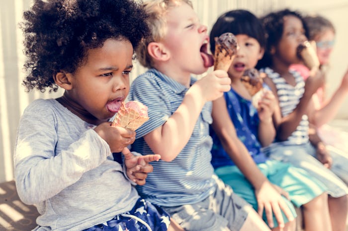 Kids eating ice cream in the summer