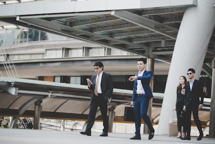 Business People Walking in the Modern City to Working in the Office.