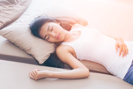 Asian cute woman deep sleep on bed in the morning, model is a asian beauty