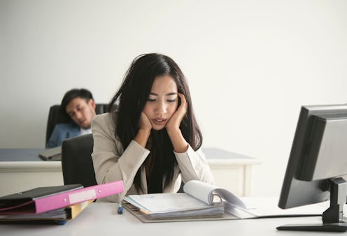 businesswoman stressed and unhappy for work in the office. life style stress.