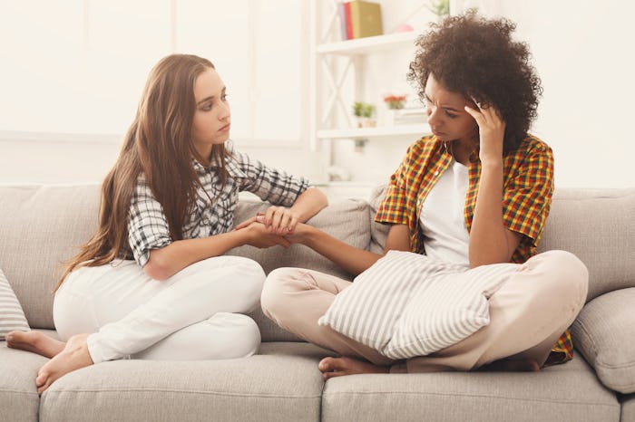 Two women talking about problems at home.