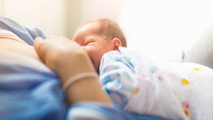 baby is happy at breastfeeding time. it is good for baby to get essential nutrition from milk.
slig...
