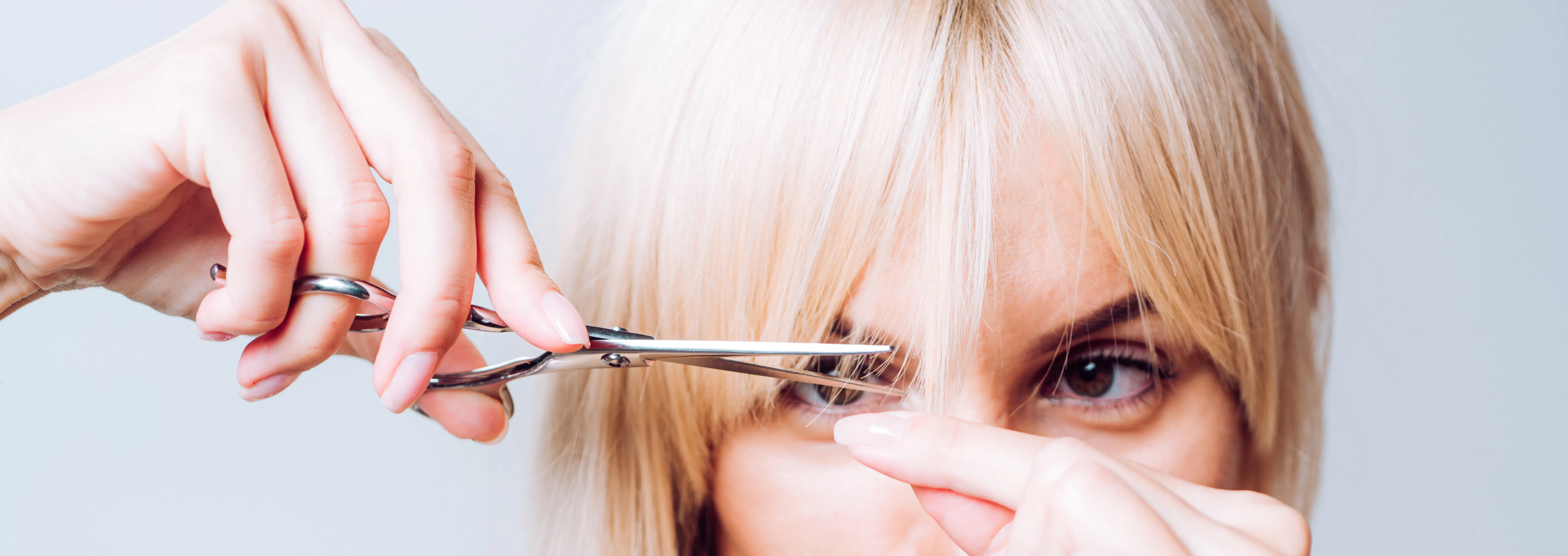 How To Cut Your Bangs The Right Way, According To An L.A. Hairstylist