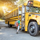 Children board a schoolbus, which may be soon replaced by a new low or no-emissions bus thanks to an...